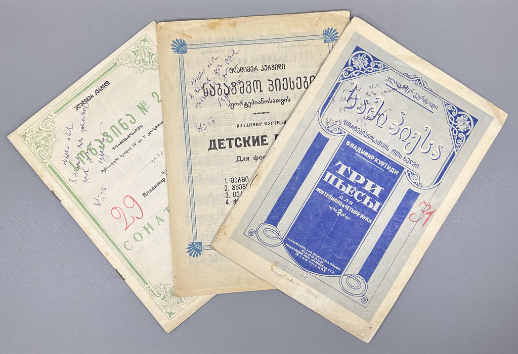 [Signed] Kurtidi, V. Lot of three piano sheet music editions (Saboavshvo p'iesebi; Sami p'iesa; Sonat'ina N 2). 1947-1955. In Georgian and Russian.