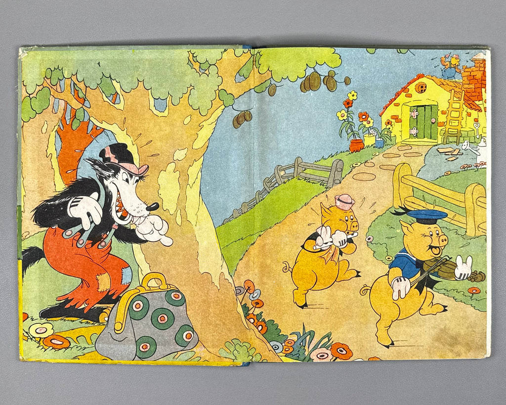 Mikhalkov, Sergey (trans.). Three Little Pigs (Tri porosenka). Text and illustrations by Walt Disney Studio, 1937. In Russian.