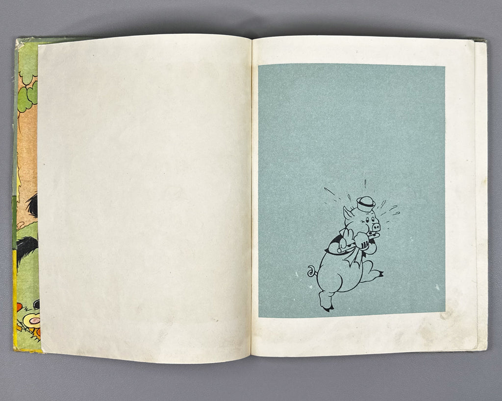 Mikhalkov, Sergey (trans.). Three Little Pigs (Tri porosenka). Text and illustrations by Walt Disney Studio, 1937. In Russian.