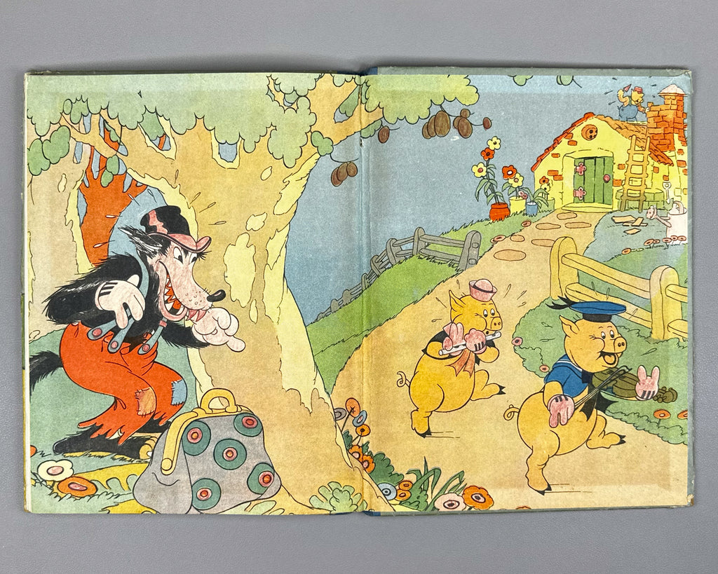 Mikhalkov, Sergey (trans.). Three Little Pigs (Tri porosenka). Text and illustrations by Walt Disney Studio, 1937. In Russian.