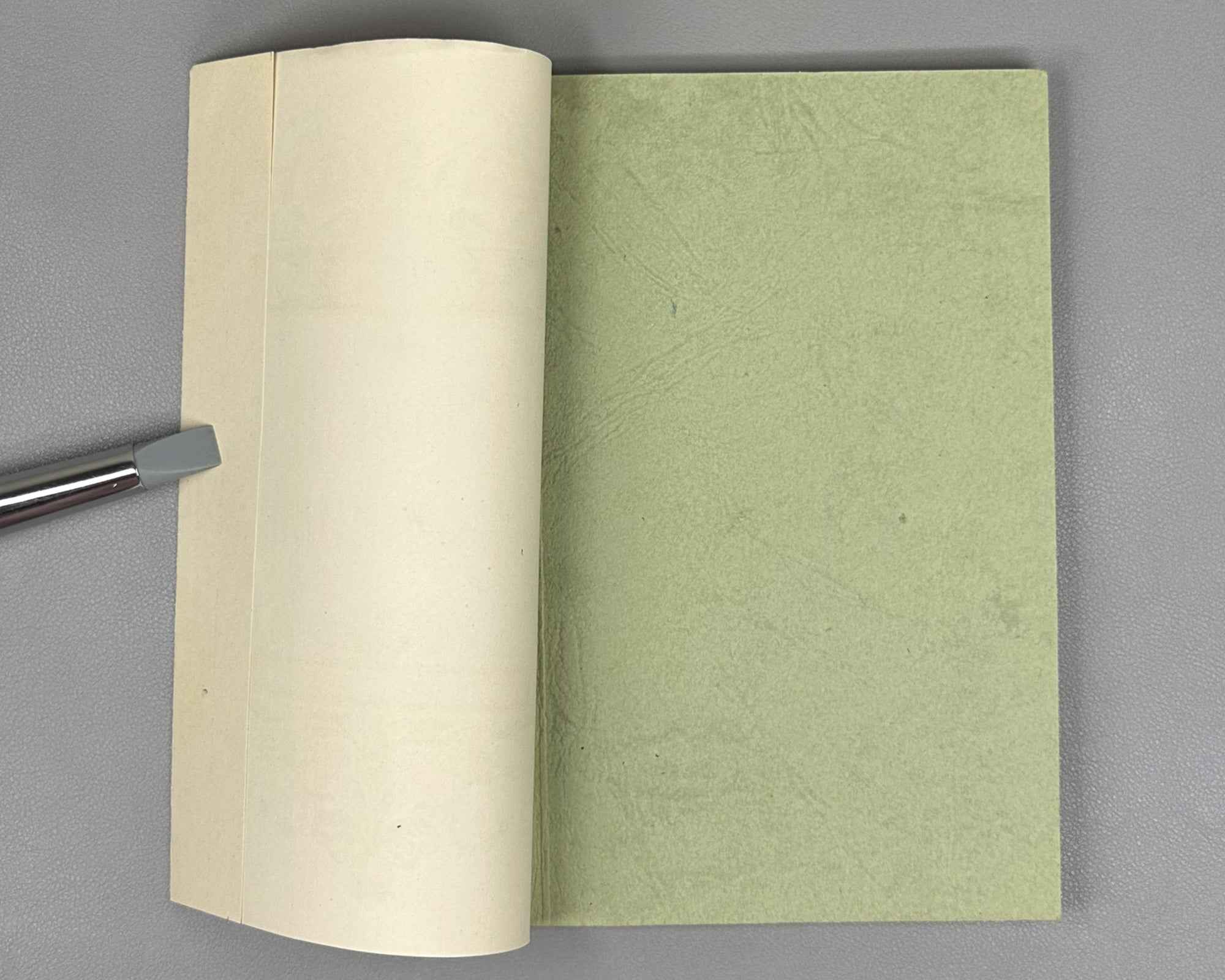 Pushkin, A. S. Ruslan and Lyudmila (Ruslan i Lyudmila). Wrapper design by Ivan Kostylev, 1946. In Russian.